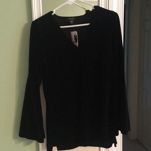 Black velvet bell sleeve top by Karen Kane